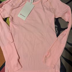 Pink Lululemon workout sweater
