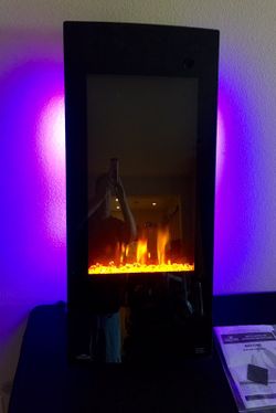 Napoleon NEFV38H Vertical Wall Mount Electric Fireplace 38 Art lighting  decor decoration for Sale in Las Vegas, NV - OfferUp