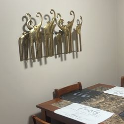  "African Elephant Metal Wall Art - Minimalist and Elegant Style". 