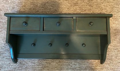 Green wooden shelf