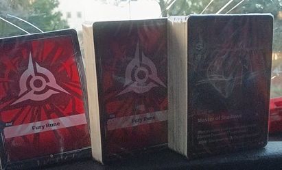 Riftbound League of Legends champion pack sealed and 2 rune packs sealed plus tons of cards