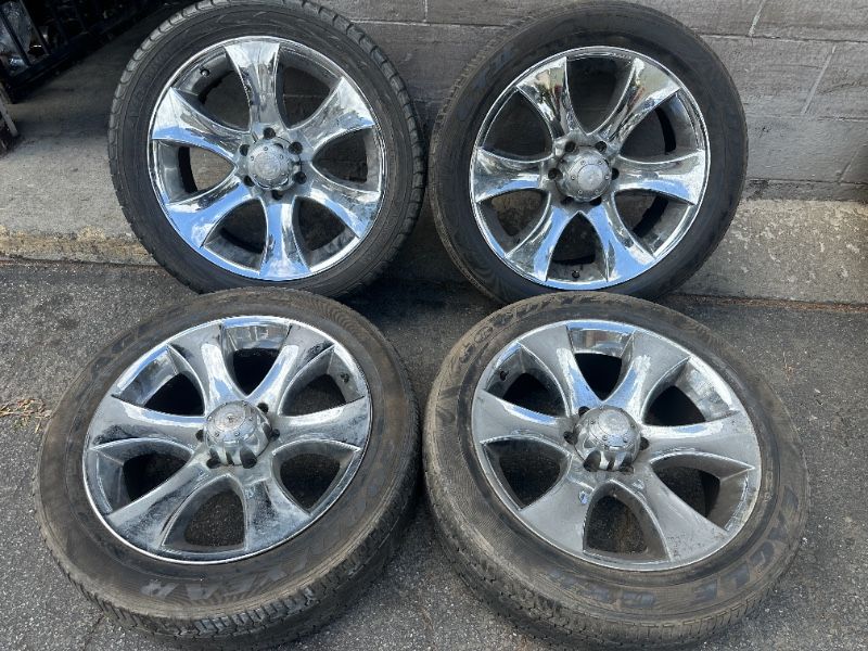 Four chrome 6 lug 20 inch rims and old tires. Chevy, Toyota, Nissan - T08697