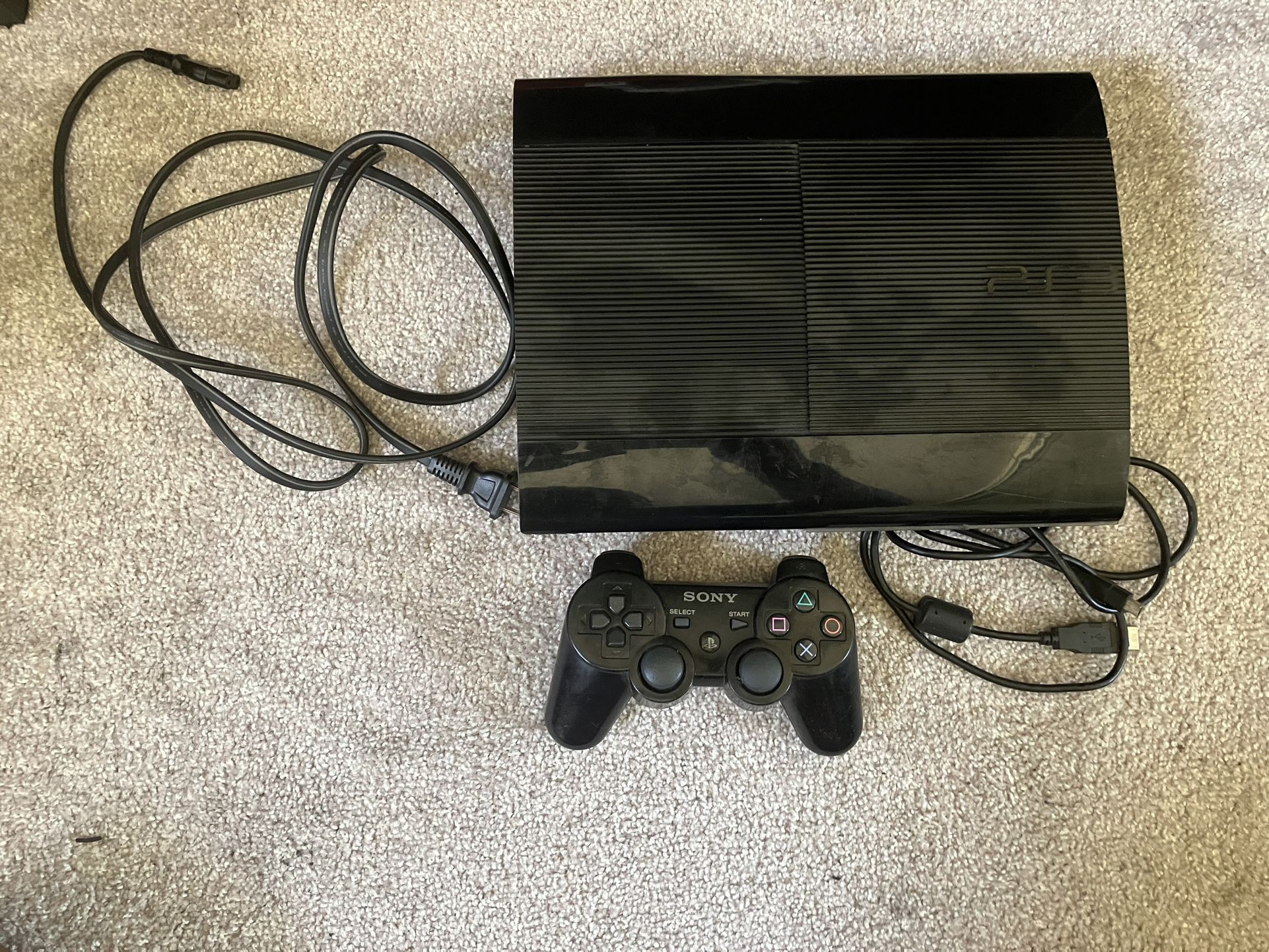 PS3 w/ controller and games