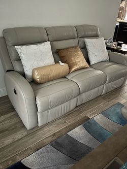 Gray Leather Reclining Sofa