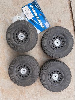 Proline raid wheels with tires