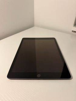 8th Gen iPad (flawless condition) with charger