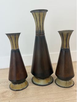 3 metal vases
