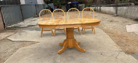 ADJUSTABLE DINING TABLE