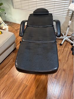Adjustable facial table