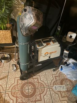 Hobart mig welder with hate and tank 210 mvp