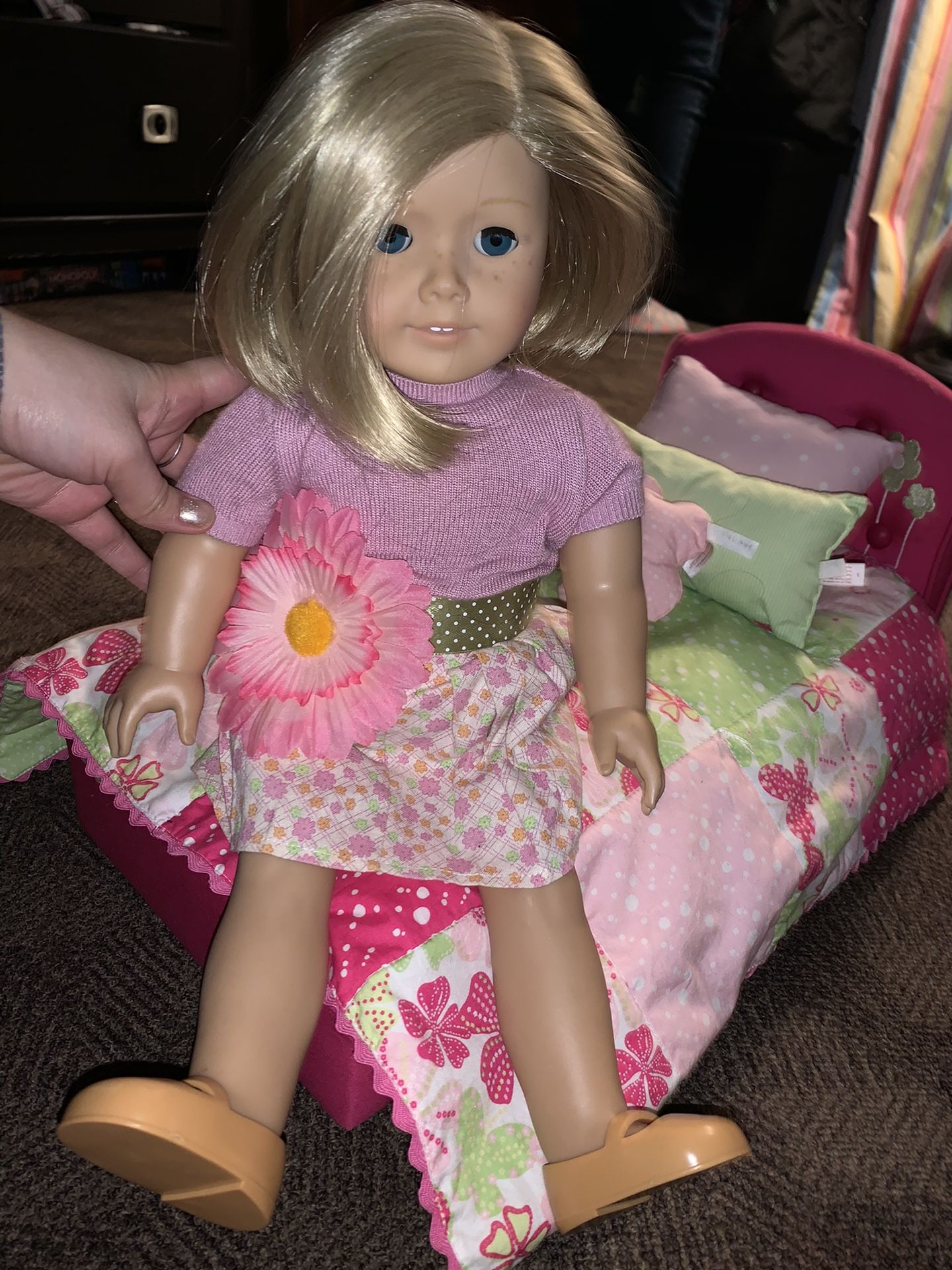 American girl doll with American girl doll bed
