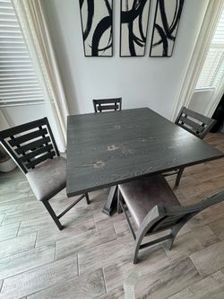Kitchen table Table is in great condition except the water spots on top  It can be painted  Chairs are in great condition