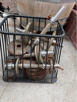 1 1/2, 2, 10 pound weights. Need cleaning from water rust. Approximately 25 pieces