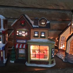 Christmas village in good condition.  3 houses set $40 each  Library $25 Post office $25 Comes from pet free and smoke free home. I can meet in Lebano