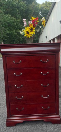 Real wood tall chest with big drawers . Drawers sliding smoothly