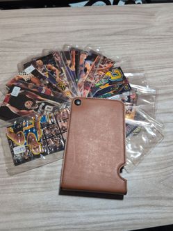 Large card wallet with older basketball cards