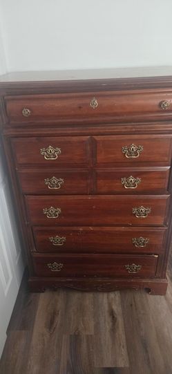 Antique looking dark wood dresser