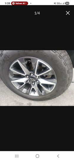 SET RIMS AND TIRES BRAND NEW