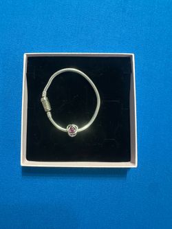 Brand new Silver Pandora bracelet with charm
