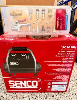 Brand new air compressor and 15 piece air hose kit