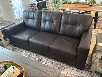 Ashley Furniture - Dark Brown Santorine Leather Sofa, Love Seat, and Chair - $1,500