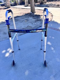Drive trigger release folding walker