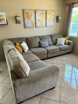 Beautiful Beige / Tan sectional couch from Ashley furniture