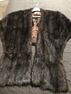 Genuine fur wrap with pockets