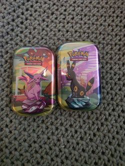 Pokemon Prismatic Tin Espeon and Umbreon Cover
