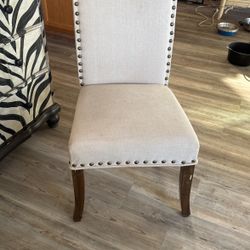 Four Dining Chairs.  Off White Upholstery With Slip Covers.