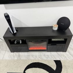 BLACK TV STAND WITH FIRE PLACE 