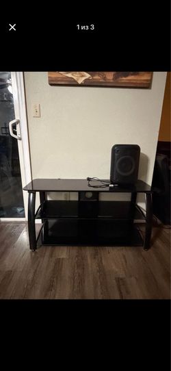 Bell'O TV stand with black glass shelves