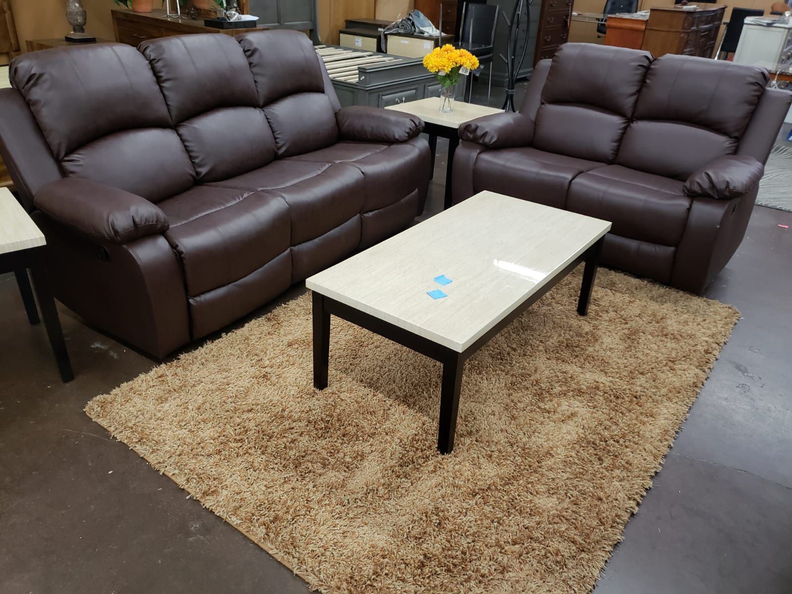 Brown leather reclining sofa and Loveseat
