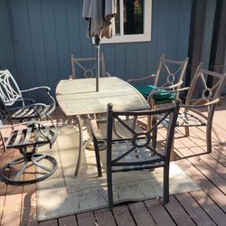Patio table,  chairs, umbrella - needs refresh