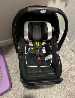 Infant car seat and base plate