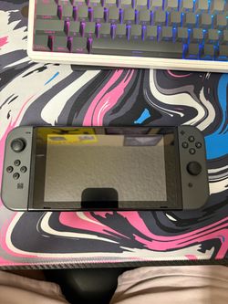 Nintendo Switch with Gray Joy-Cons and extra 2 controllers with 128 gb storage and everything original
