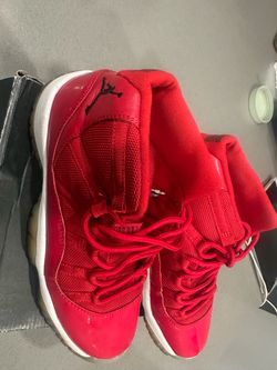 Air Jordan 11 Red High-Top Sneakers