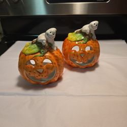Pumpkin candle holders.