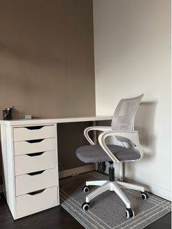 IKEA desk with drawers + adjustable chair + rug