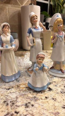 Porcelain Nurse Statues (4)