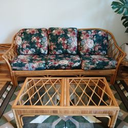 Set of flowery bamboo armchairs. Coffee table and side table 