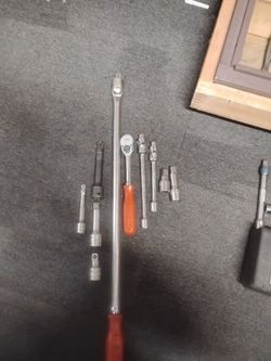 Mac 1/2in breaker bar, Mac 3/8in ratchet, Matco extensions 3/8/1/2 in drives, Snap-On extensions 3/8 1/2 in drives.