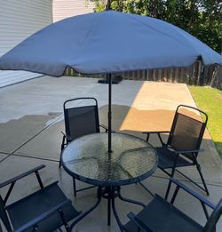 Patio set - 4 chairs, table, umbrella