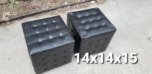 Black tufted ottomans