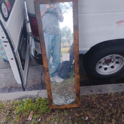 Mirror With A Hidden Cabinet Inside