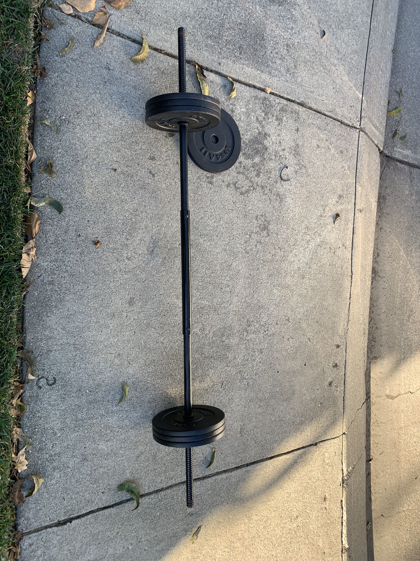 70 lbs of Weights On A Straight Bar