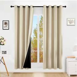 Beige Blackout Curtain Panels with Grommets.$15/4 pieces