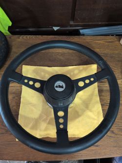 Black 3-Spoke Steering Wheel with Train Logo