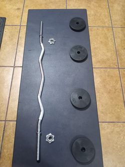Solid curl bar Rubber coated plates4x5lbs Brand new