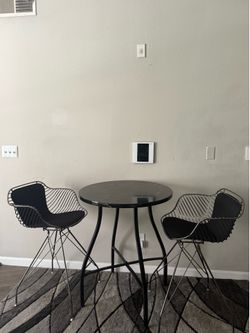 Bar stools and table set